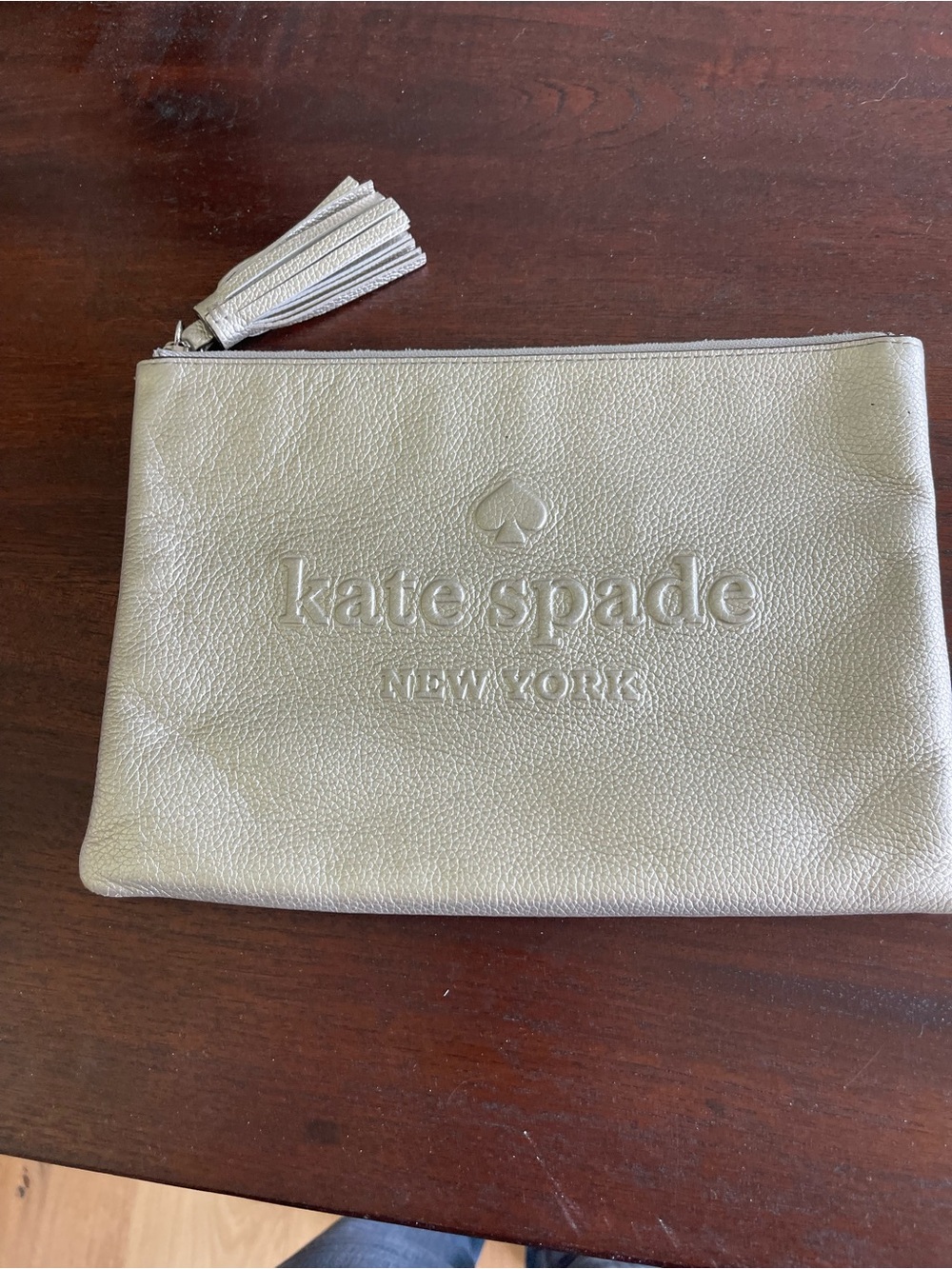 kate spade metallic gold leather clutch with tassel